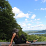 Young woman viewing Olivia's Overlook. Photo by Kara Thornton.
