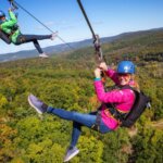 Zip lining at Catamount on a sunny day