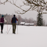 A couple cross country skiing at Notchview.